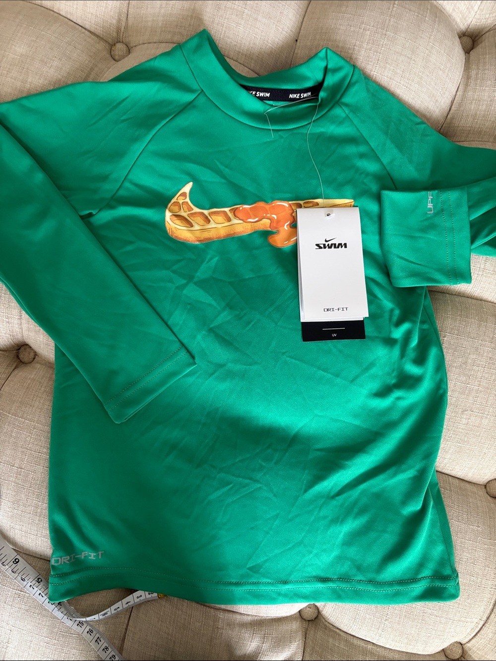 Nike Kids Green Rashguard with Orange Swoosh Graphic